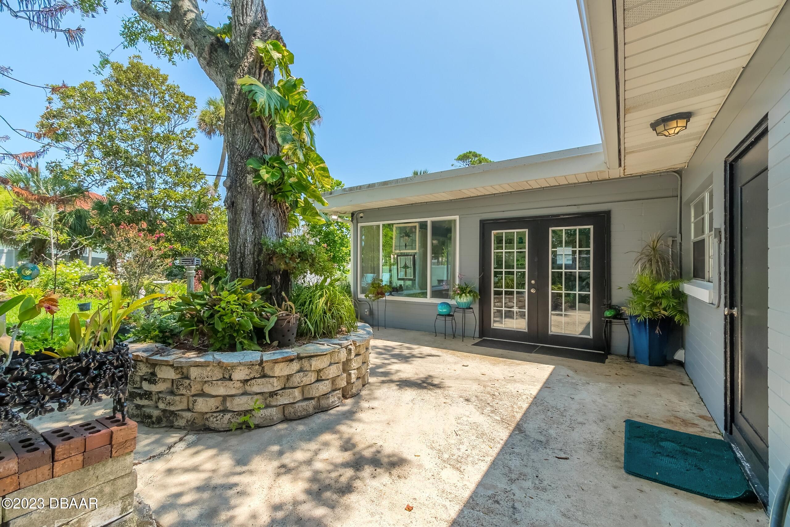 39 Amsden Road Ormond Beach, FL 32176 - Photo 26 of 38 Backyard Patio