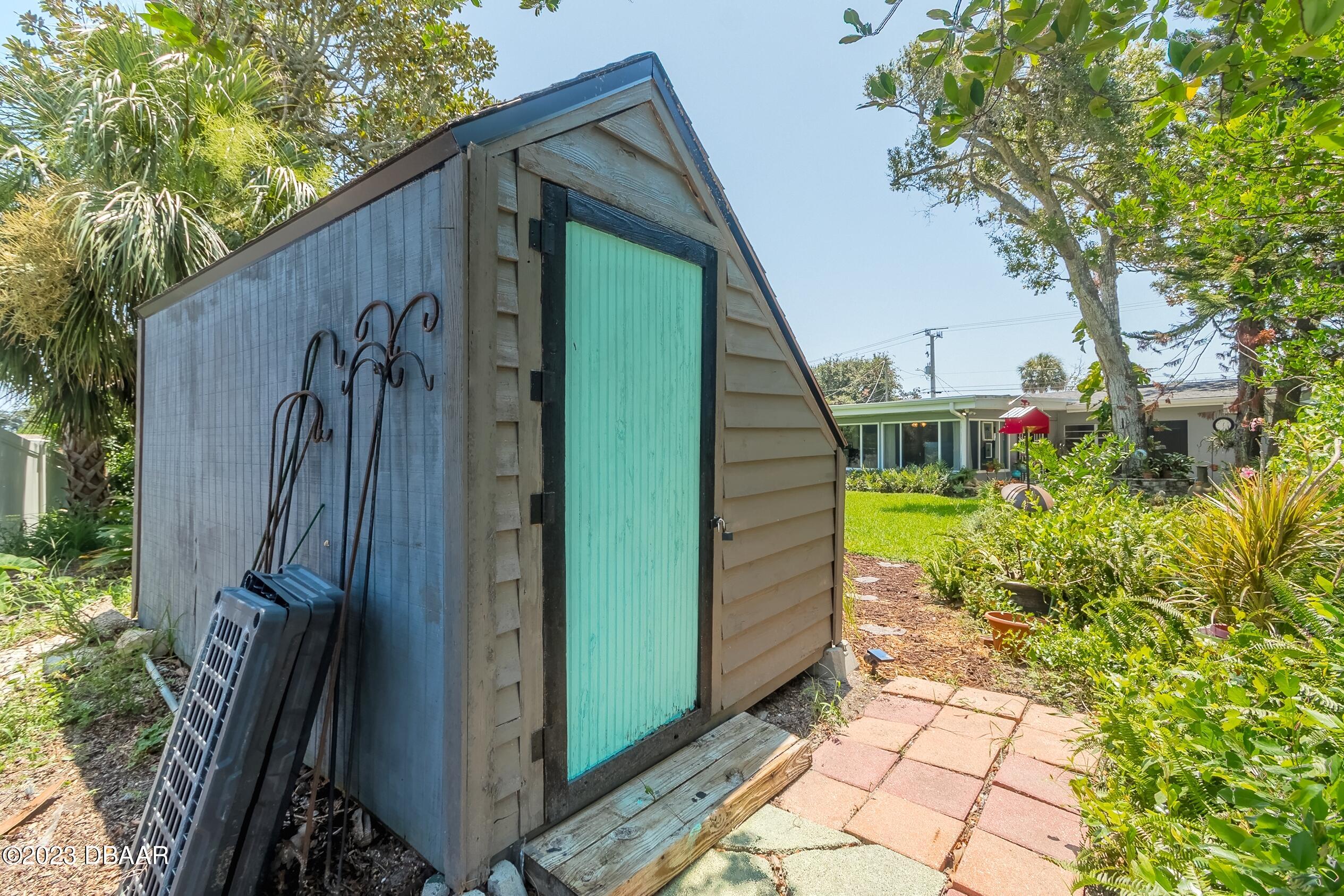 39 Amsden Road Ormond Beach, FL 32176 - Photo 31 of 38 Storage/potting Shed