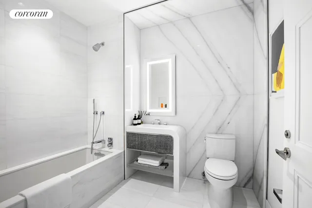 a living room with furniture and wall paintings