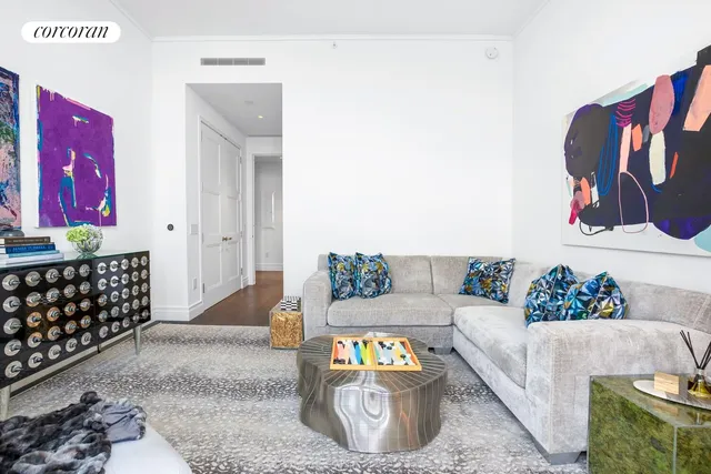 a living room with furniture and a couch