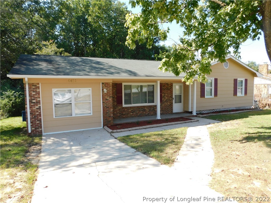4451 Ruby Road Fayetteville, NC 28311 - Photo 1 of 14 a front view of house with yard