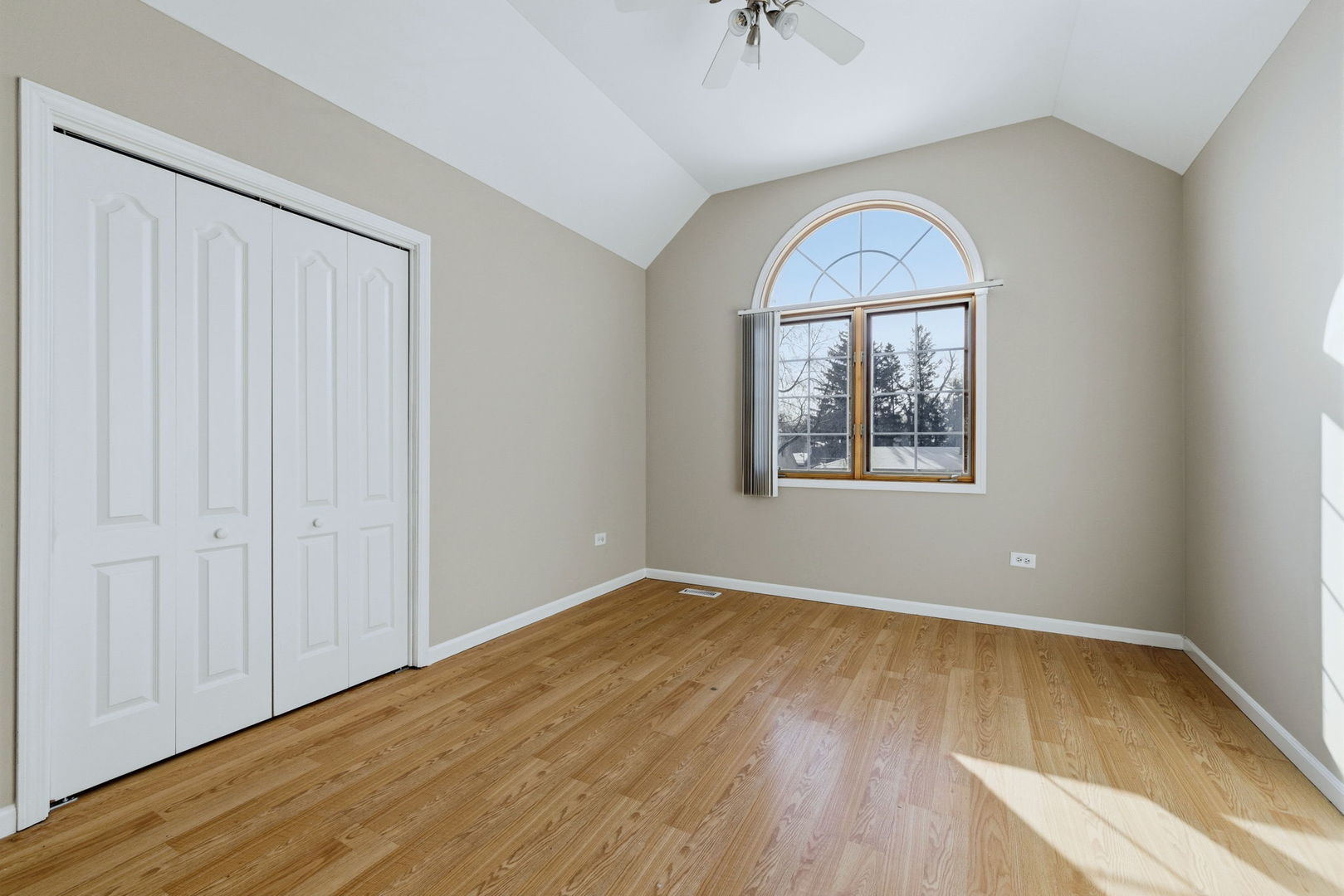 1305 Campbell Street Joliet, IL 60435 - Photo 19 of 34 an empty room with a window and wooden floor