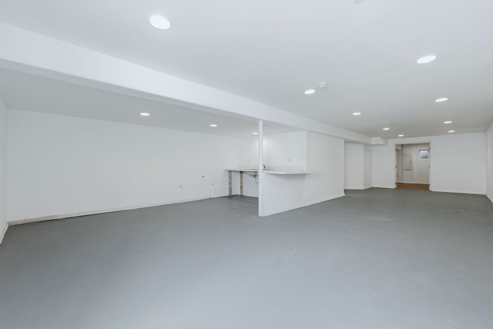 1305 Campbell Street Joliet, IL 60435 - Photo 24 of 34 a view of an empty room with a refrigerator
