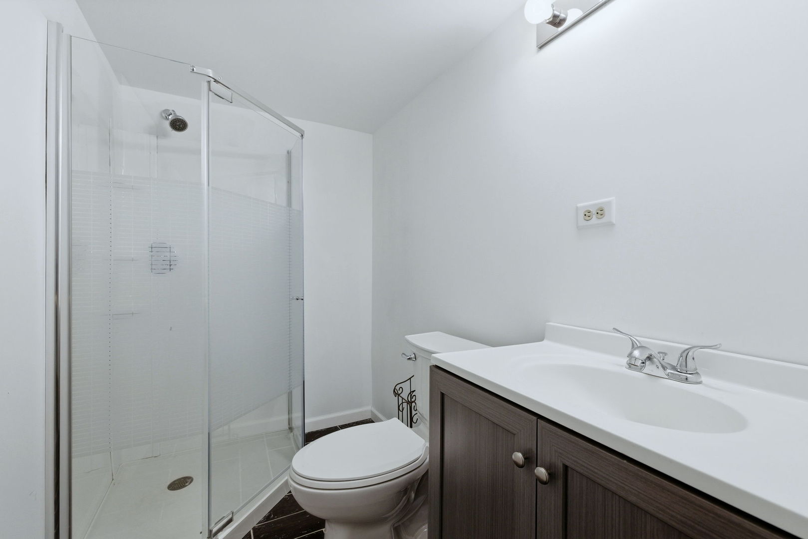 1305 Campbell Street Joliet, IL 60435 - Photo 26 of 34 a bathroom with a sink toilet and shower