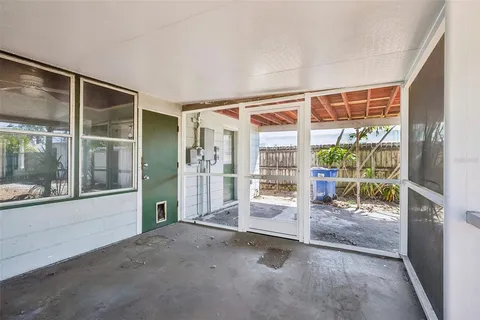 a view of livingroom with large windows