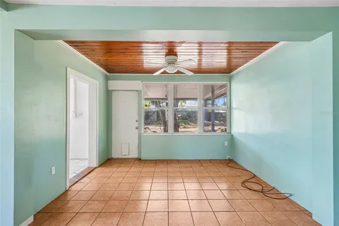 view of an empty room with a window