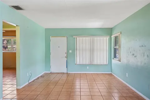 a view of an empty room with window