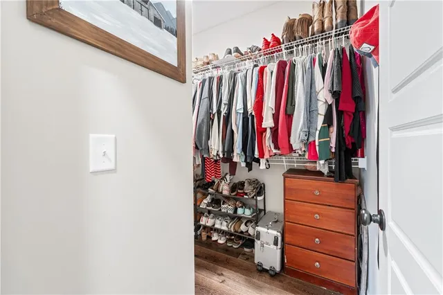 an aerial view of a house with a big yard