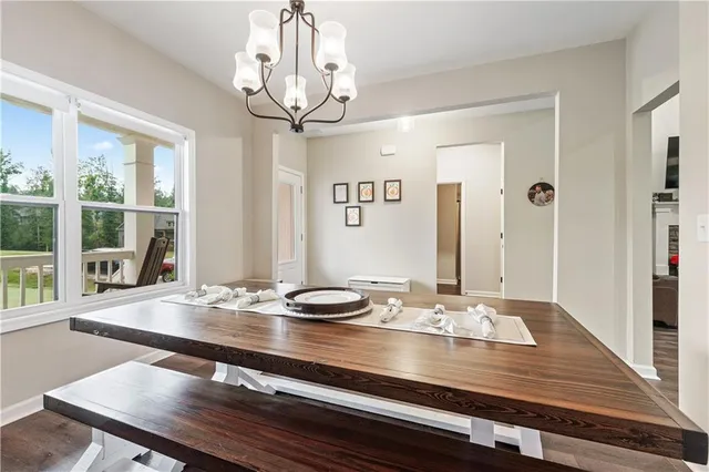 a kitchen with stainless steel appliances granite countertop a refrigerator stove microwave and sink