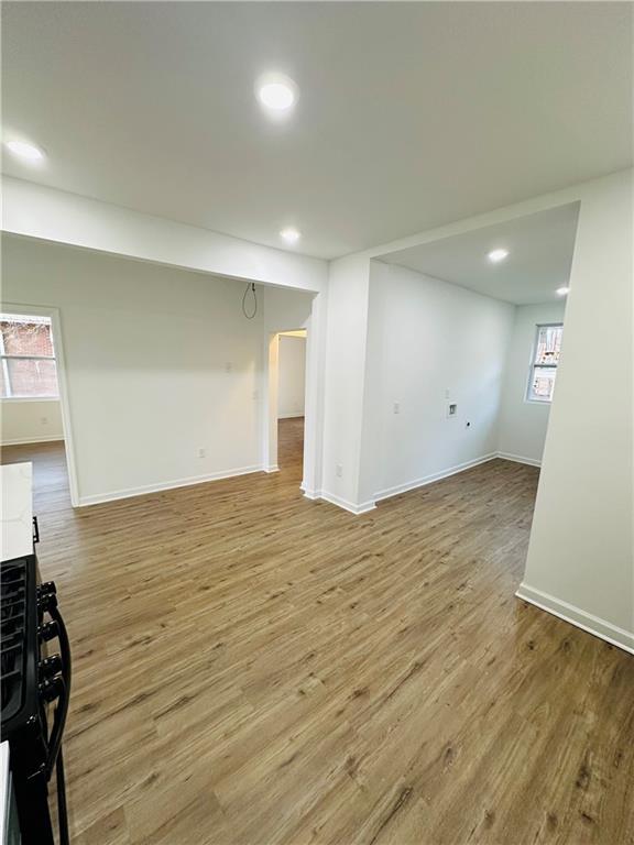 25 4th Street Gainesville, GA 30504 - Photo 13 of 20 an empty room with wooden floor and closet