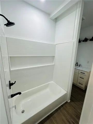a bathroom with a bathtub