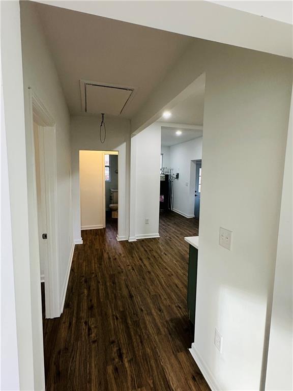 25 4th Street Gainesville, GA 30504 - Photo 8 of 20 a view of an empty room and wooden floor