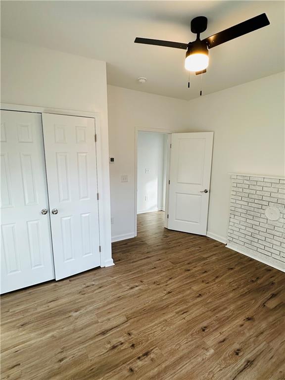 25 4th Street Gainesville, GA 30504 - Photo 10 of 20 a view of empty room with wooden floor