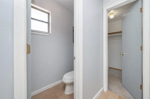 a bathroom with a toilet sink