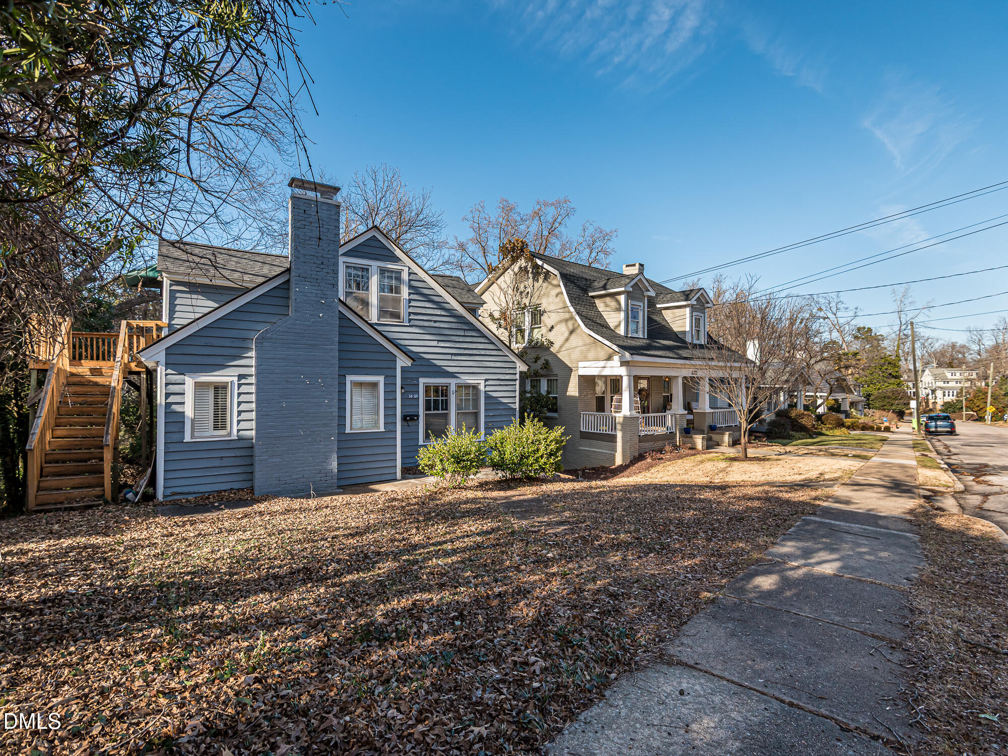 1825 White Oak Road Raleigh, NC 27608 - Photo 5 of 35 a front view of a house with a yard