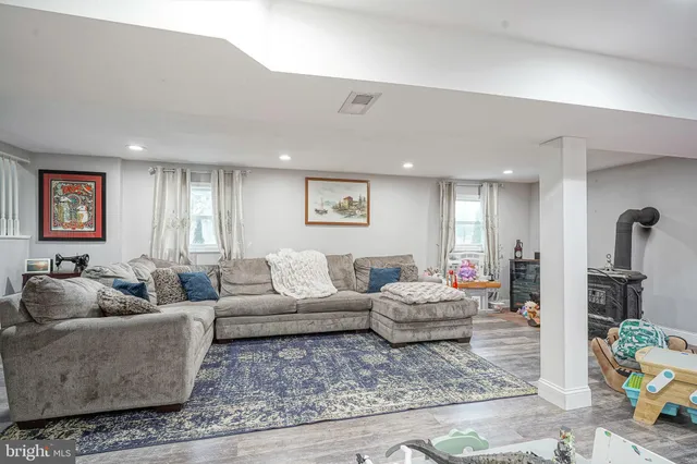 a living room with furniture and a couch