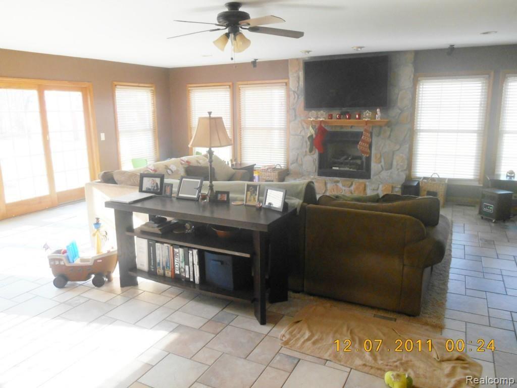 15200 Haggerty Road Belleville, MI 48111 - Photo 29 of 99 VERY OPEN KITCHEN DINING TO GREAT ROOM WITH NAT. FIREPLACE