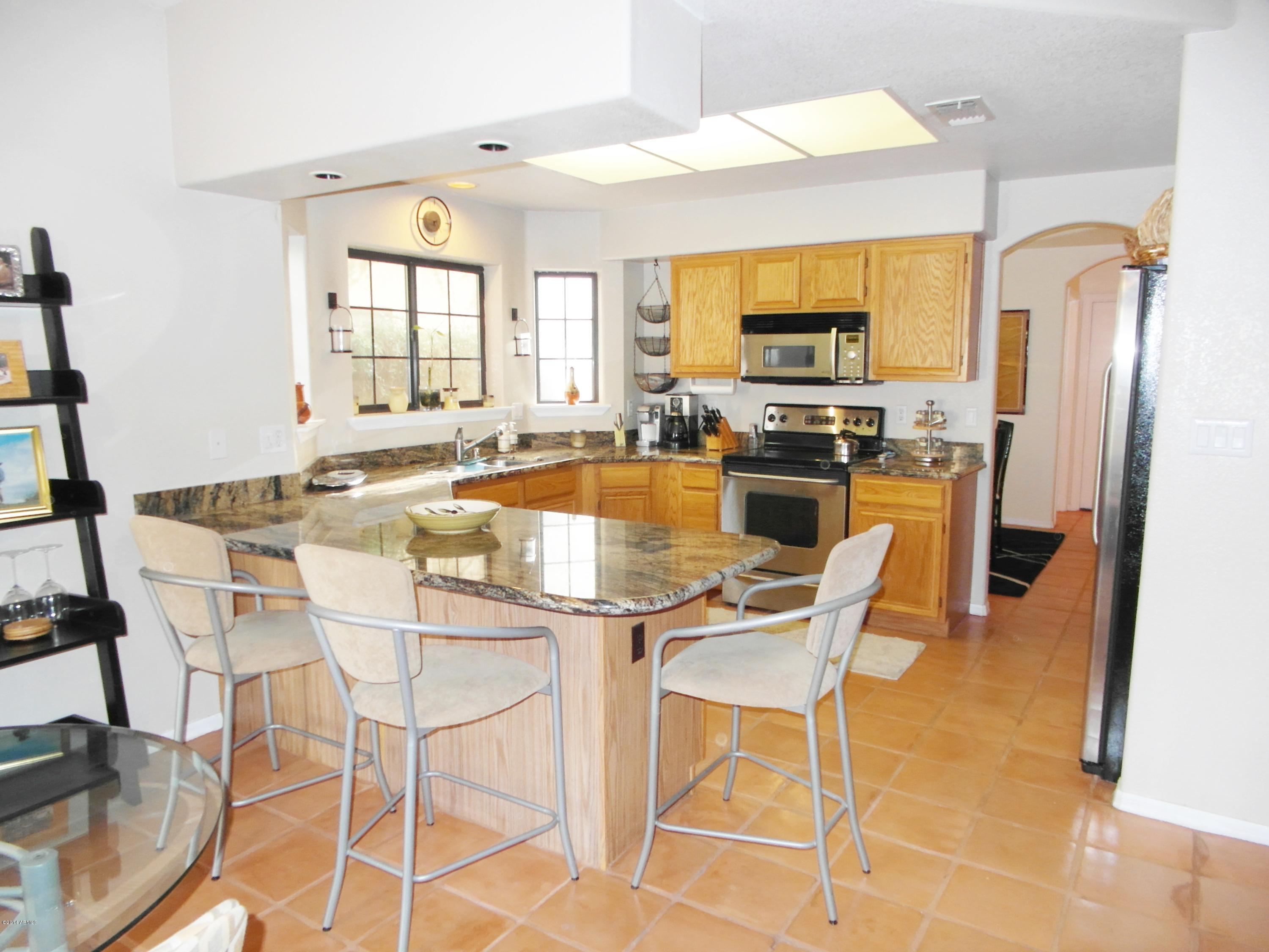 1001 East Griswold Road, Unit 35 Phoenix, AZ 85020 - Photo 12 of 39 Family Room View to Kitchen