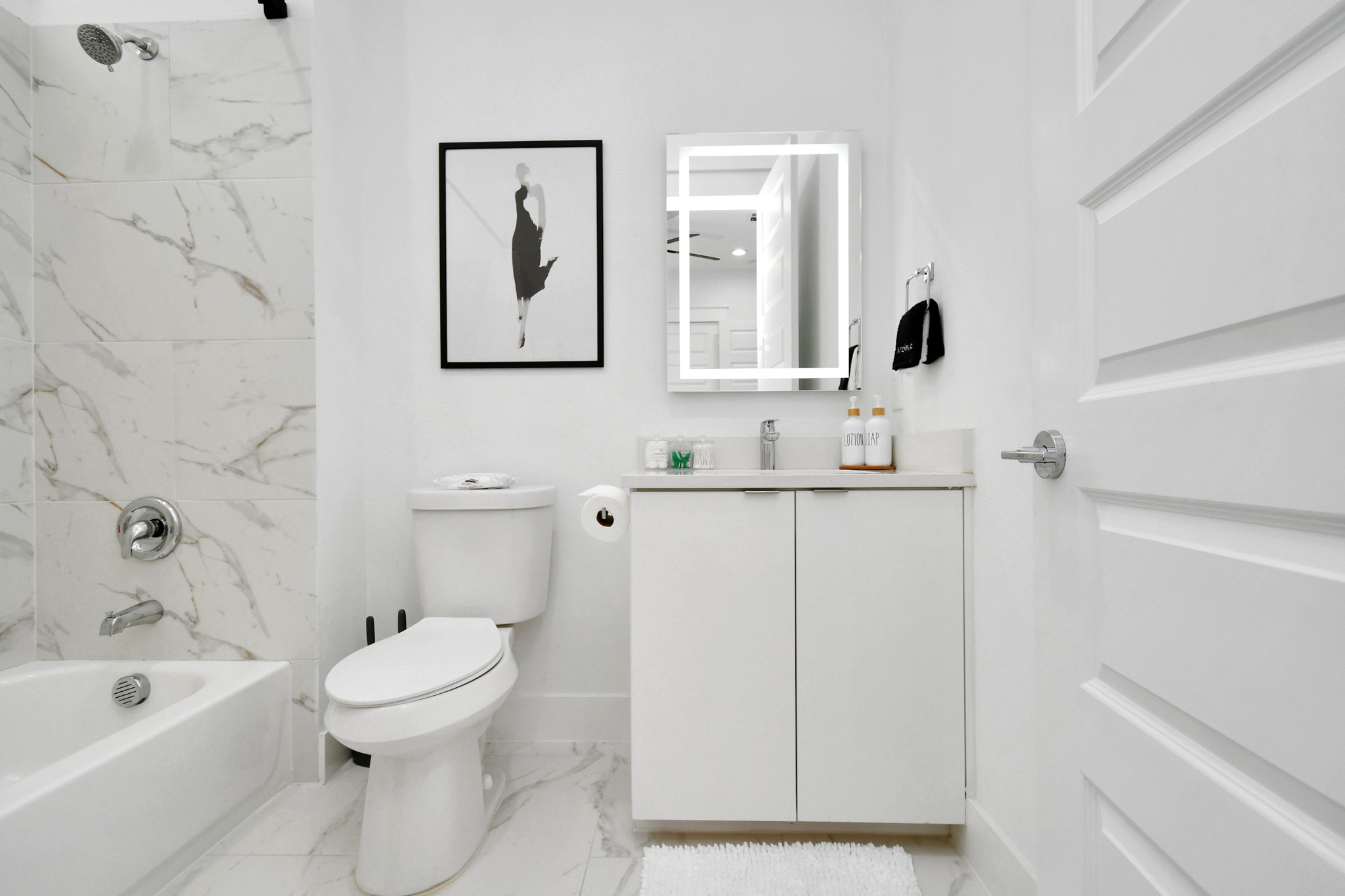 531 Schweikhardt Street Houston, TX 77020 - Photo 13 of 18 a bathroom with a toilet sink and mirror