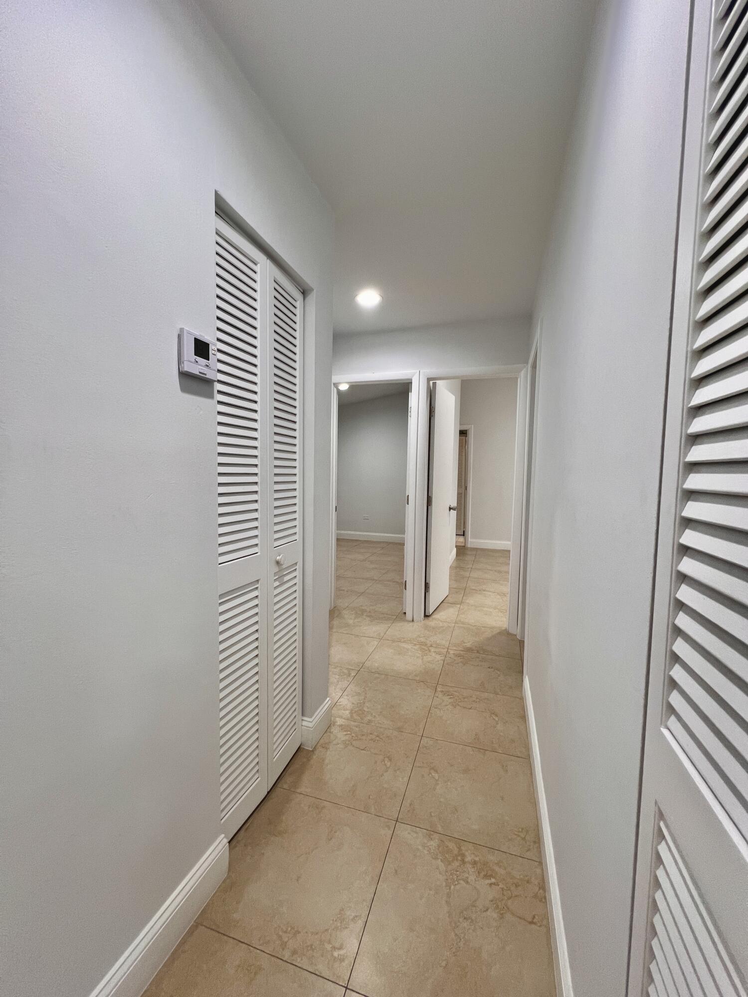 414 Coconut Drive Key Largo, FL 33037 - Photo 11 of 36 a view of entryway with wooden floor