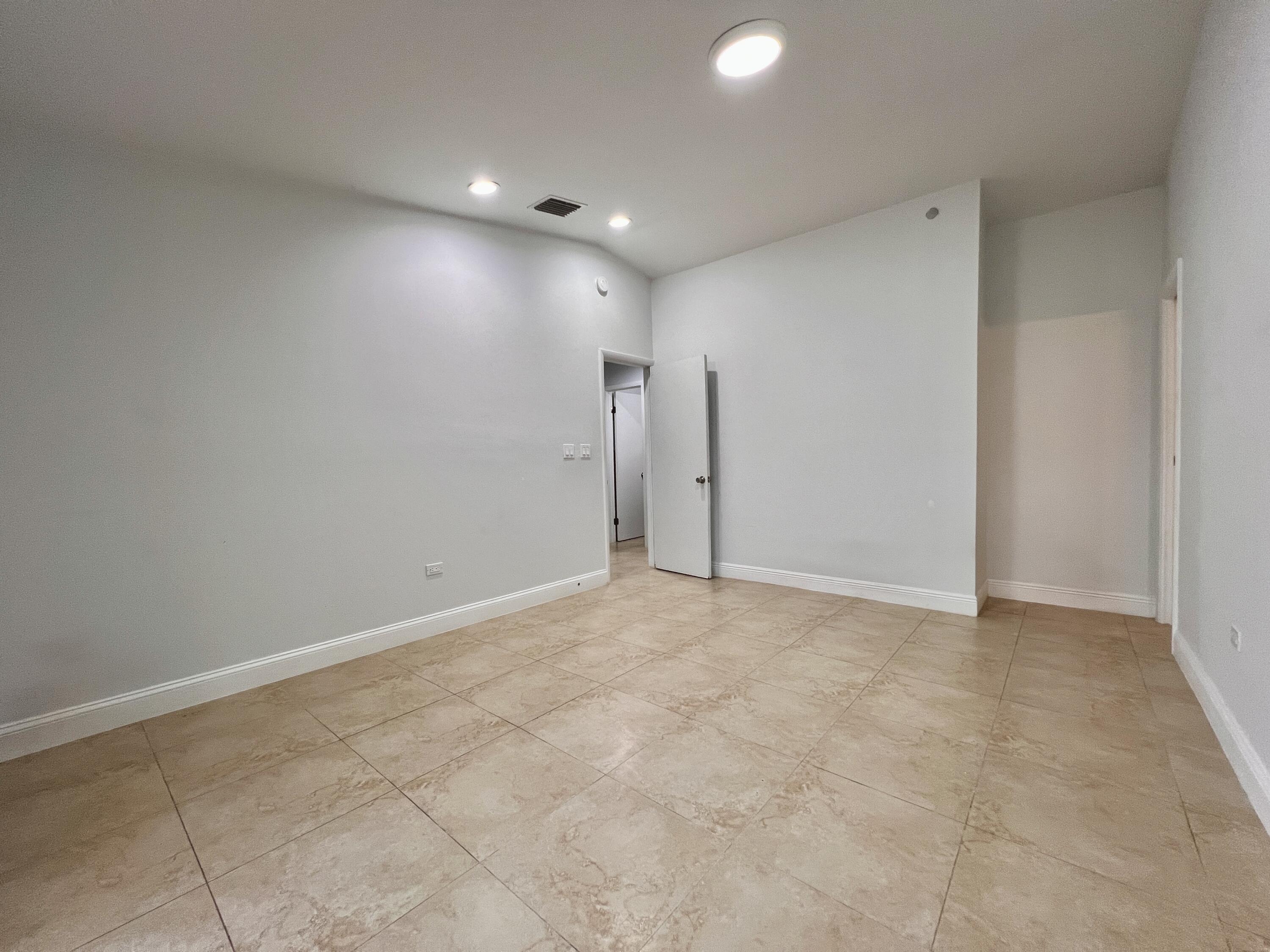 414 Coconut Drive Key Largo, FL 33037 - Photo 18 of 36 a view of an empty room