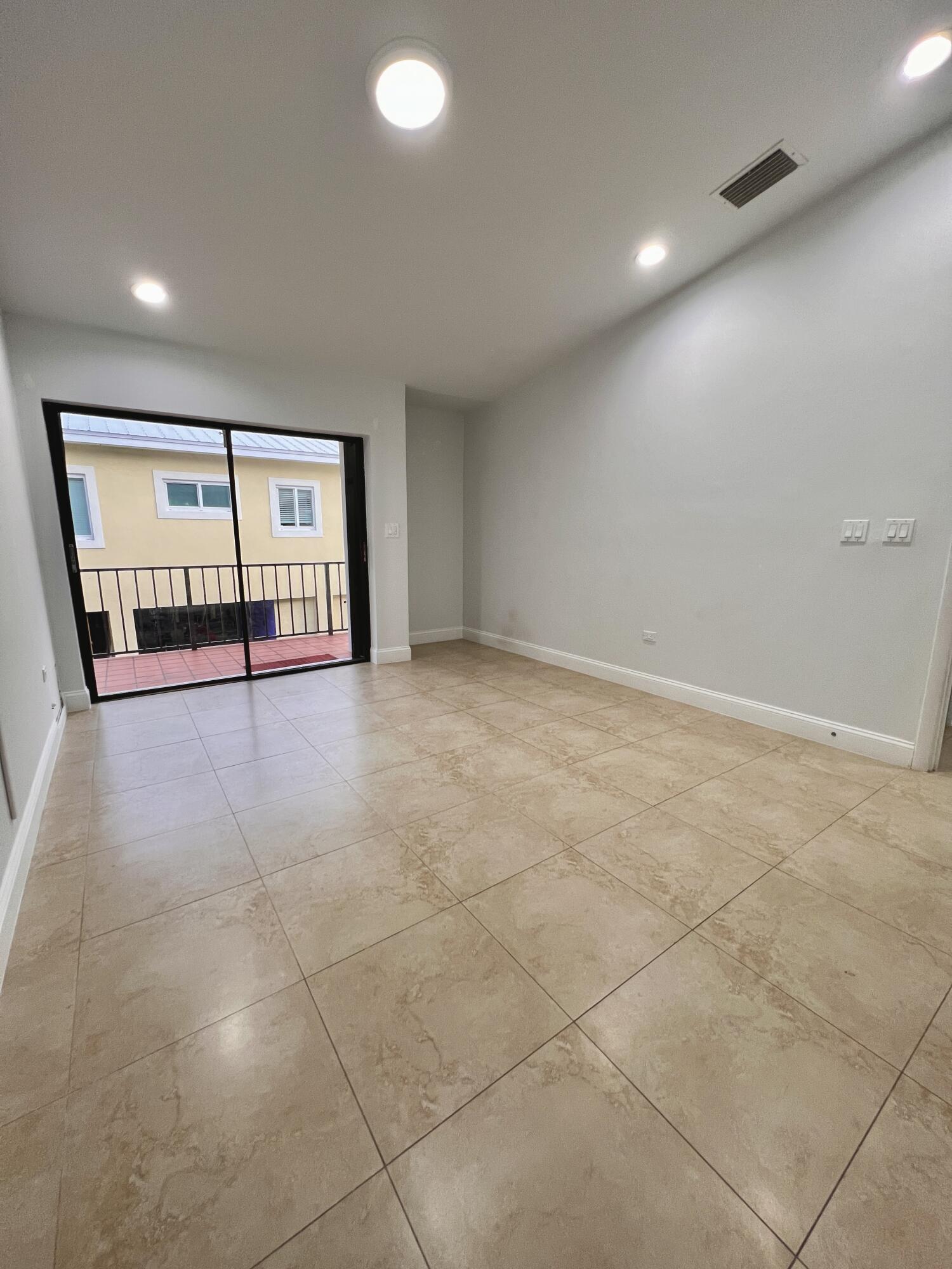 414 Coconut Drive Key Largo, FL 33037 - Photo 19 of 36 a view of an empty room