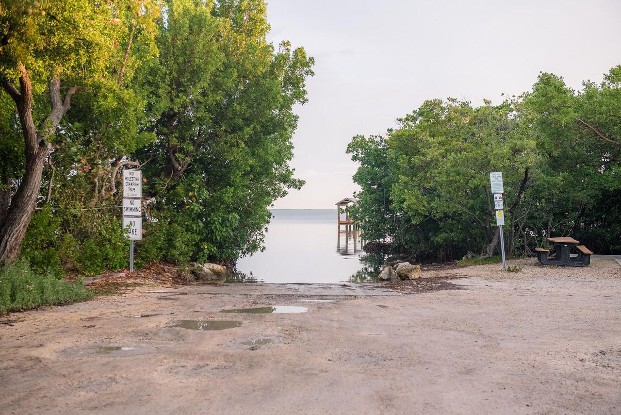 414 Coconut Drive Key Largo, FL 33037 - Photo 35 of 36 a view of backyard and trees