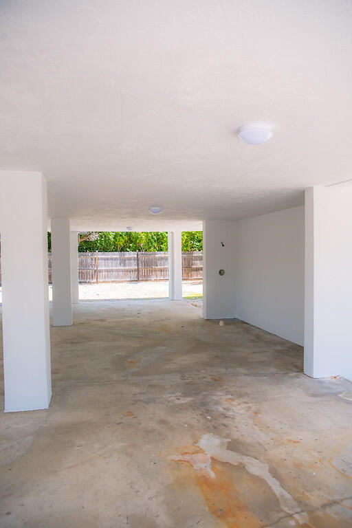 414 Coconut Drive Key Largo, FL 33037 - Photo 5 of 36 an empty room with windows and closet