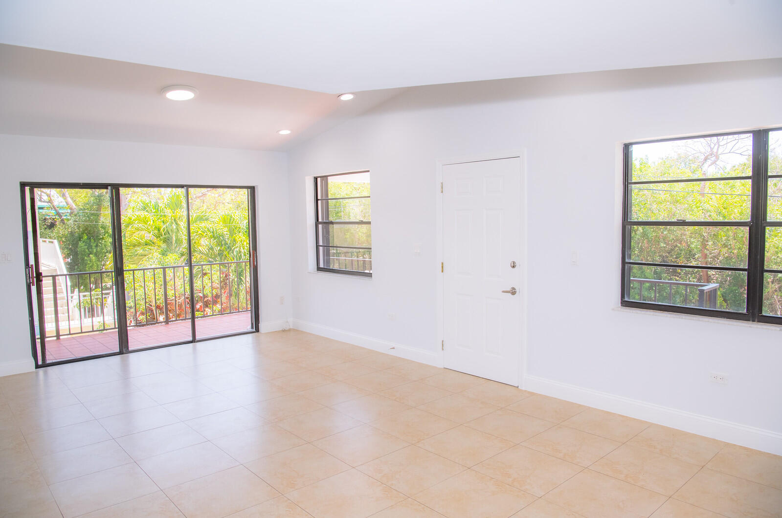 414 Coconut Drive Key Largo, FL 33037 - Photo 10 of 36 a view of an empty room with a window