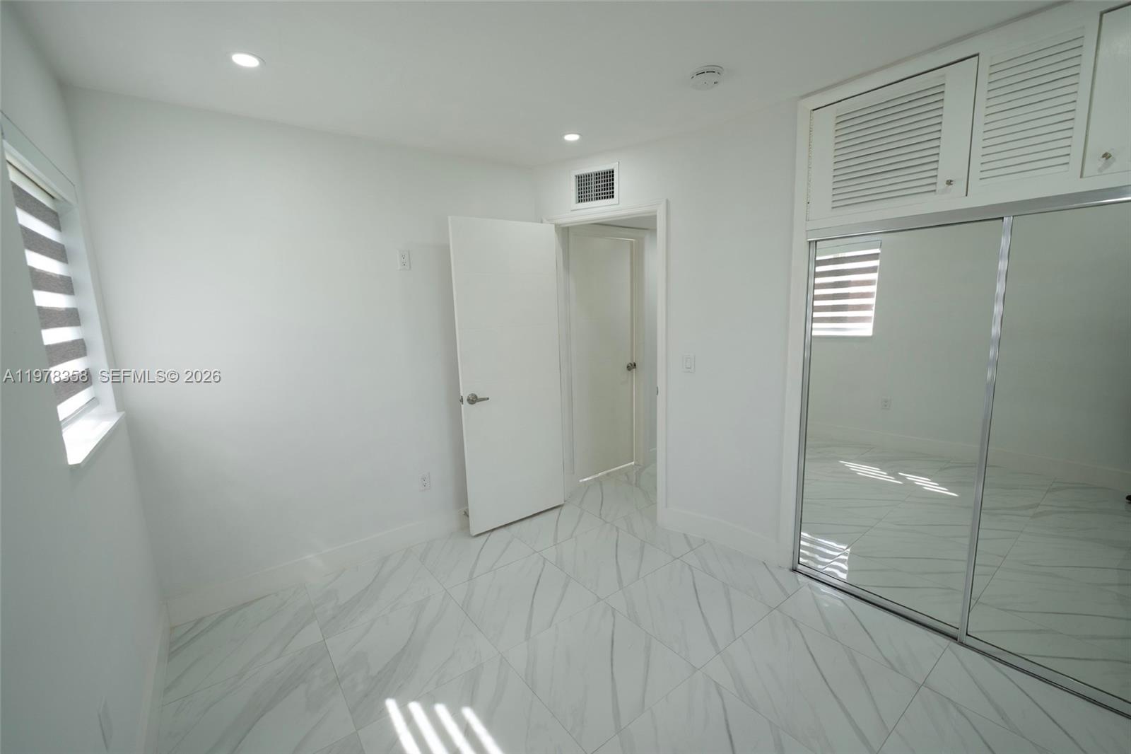 10381 Southwest 32nd Street Miami, FL 33165 - Photo 19 of 38 a view of an empty room