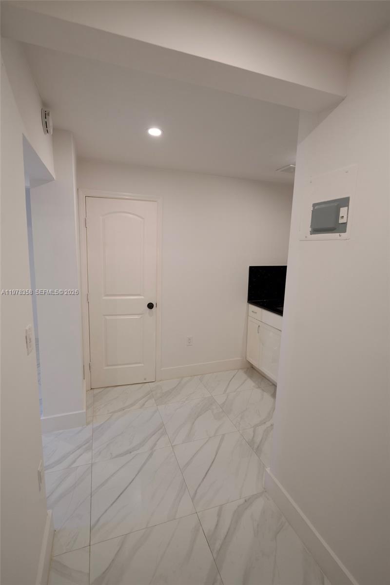 10381 Southwest 32nd Street Miami, FL 33165 - Photo 22 of 38 a view of empty room with a window