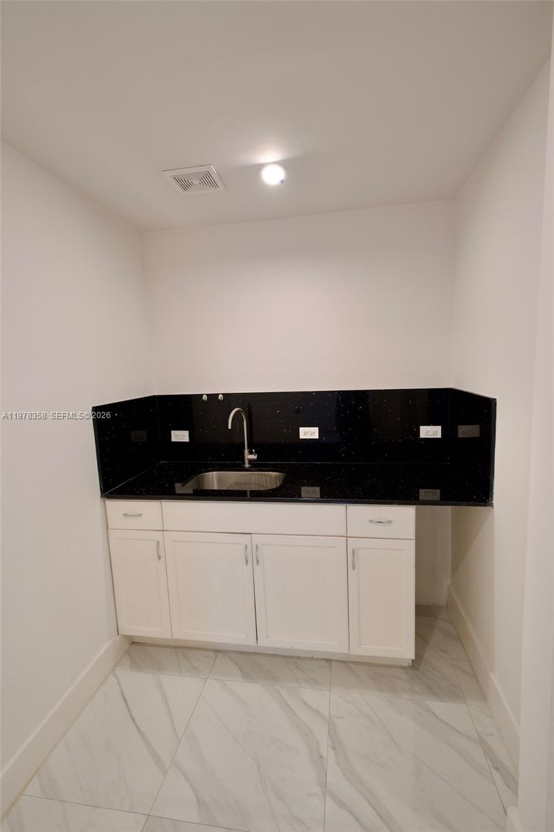 10381 Southwest 32nd Street Miami, FL 33165 - Photo 23 of 38 a view of cabinets