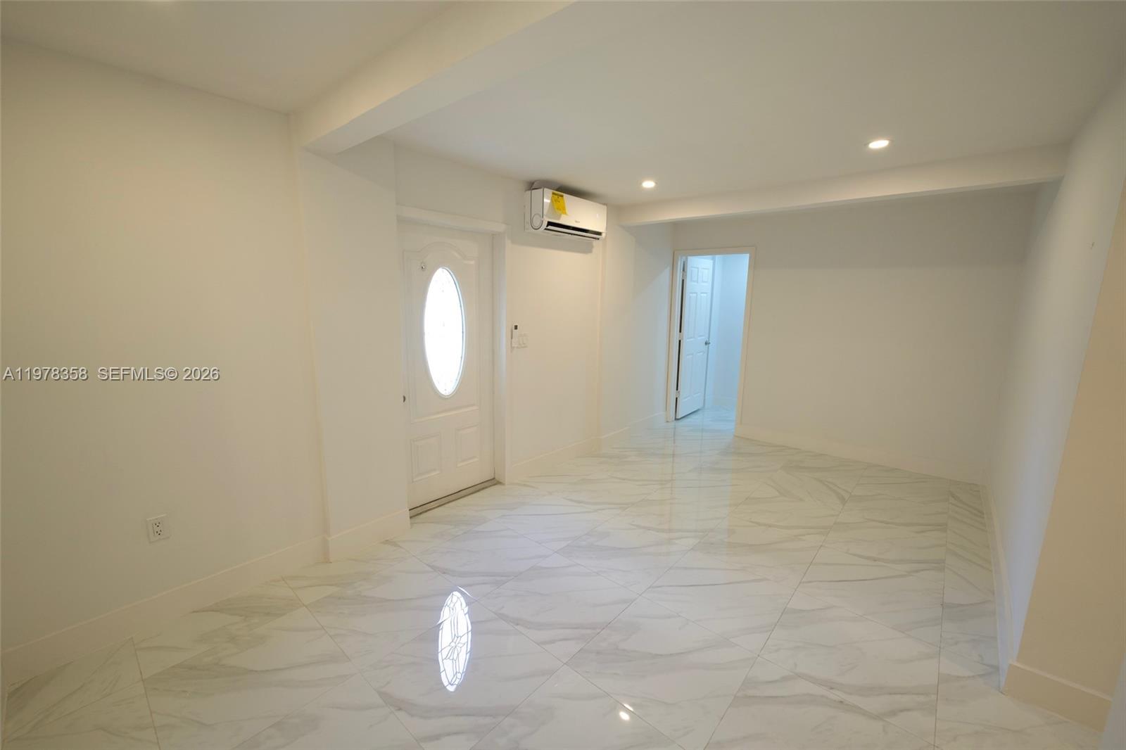 10381 Southwest 32nd Street Miami, FL 33165 - Photo 24 of 38 a view of a livingroom with wooden floor