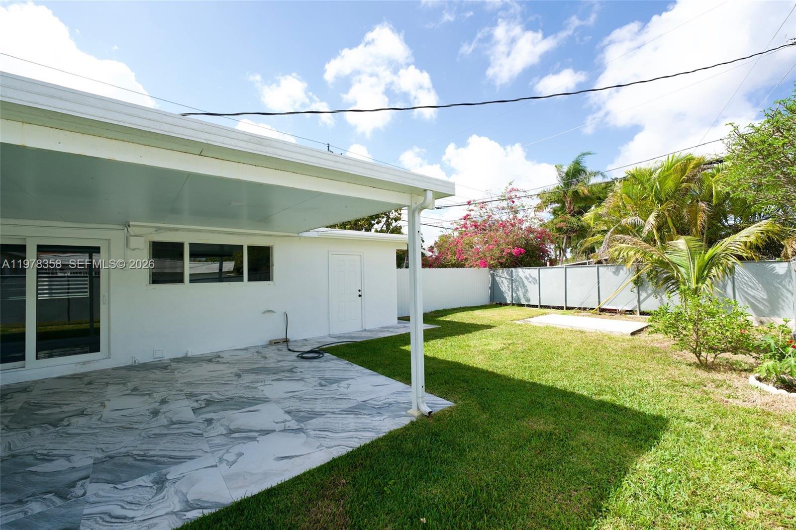 10381 Southwest 32nd Street Miami, FL 33165 - Photo 34 of 38 a view of a backyard