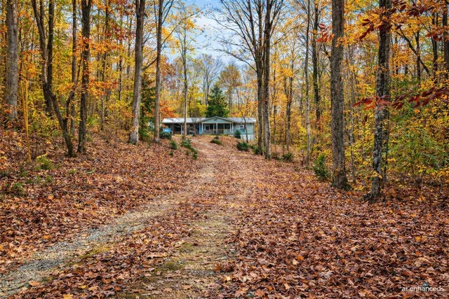 a kitchen that has a sink and a large window