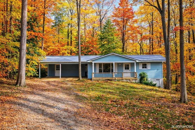 a kitchen with stainless steel appliances granite countertop a stove and a microwave