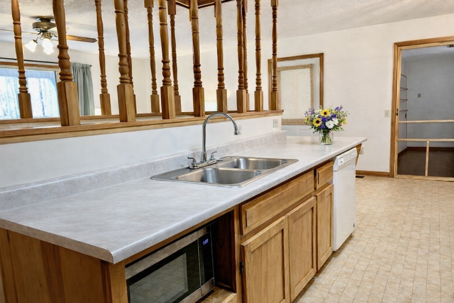 1135 West Mink Branch Road Waynesboro, TN 38485 - Photo 41 of 68 a kitchen that has a sink and a large window