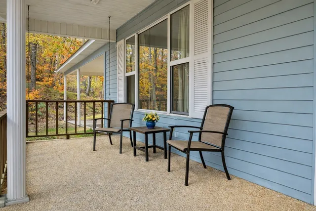 a front view of house with a garden