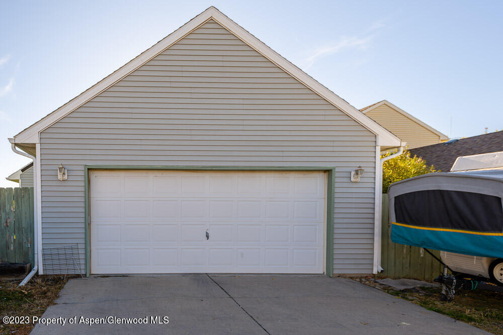 2807 Acacia Avenue Rifle, CO 81650 - Photo 23 of 24 a view of a house with backyard