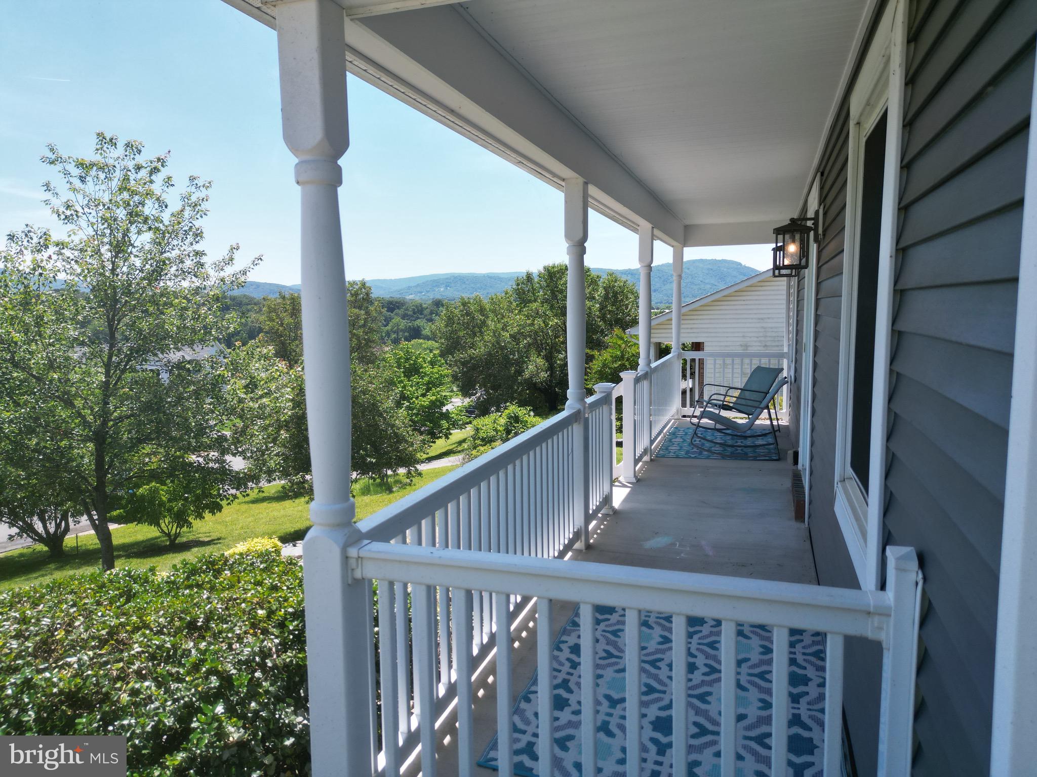 1185 Kesler Road Front Royal, VA 22630 - Photo 12 of 51 a view of a balcony with wooden floor