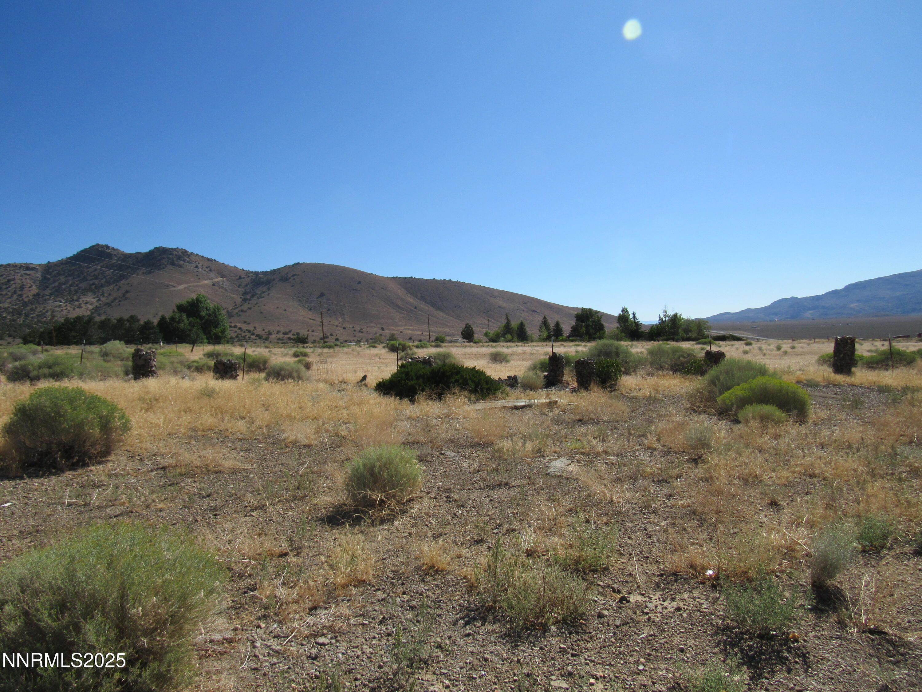 4151 Gray Hills Road Wellington, NV 89444 - Photo 14 of 25 a view of a lake with mountains in the background