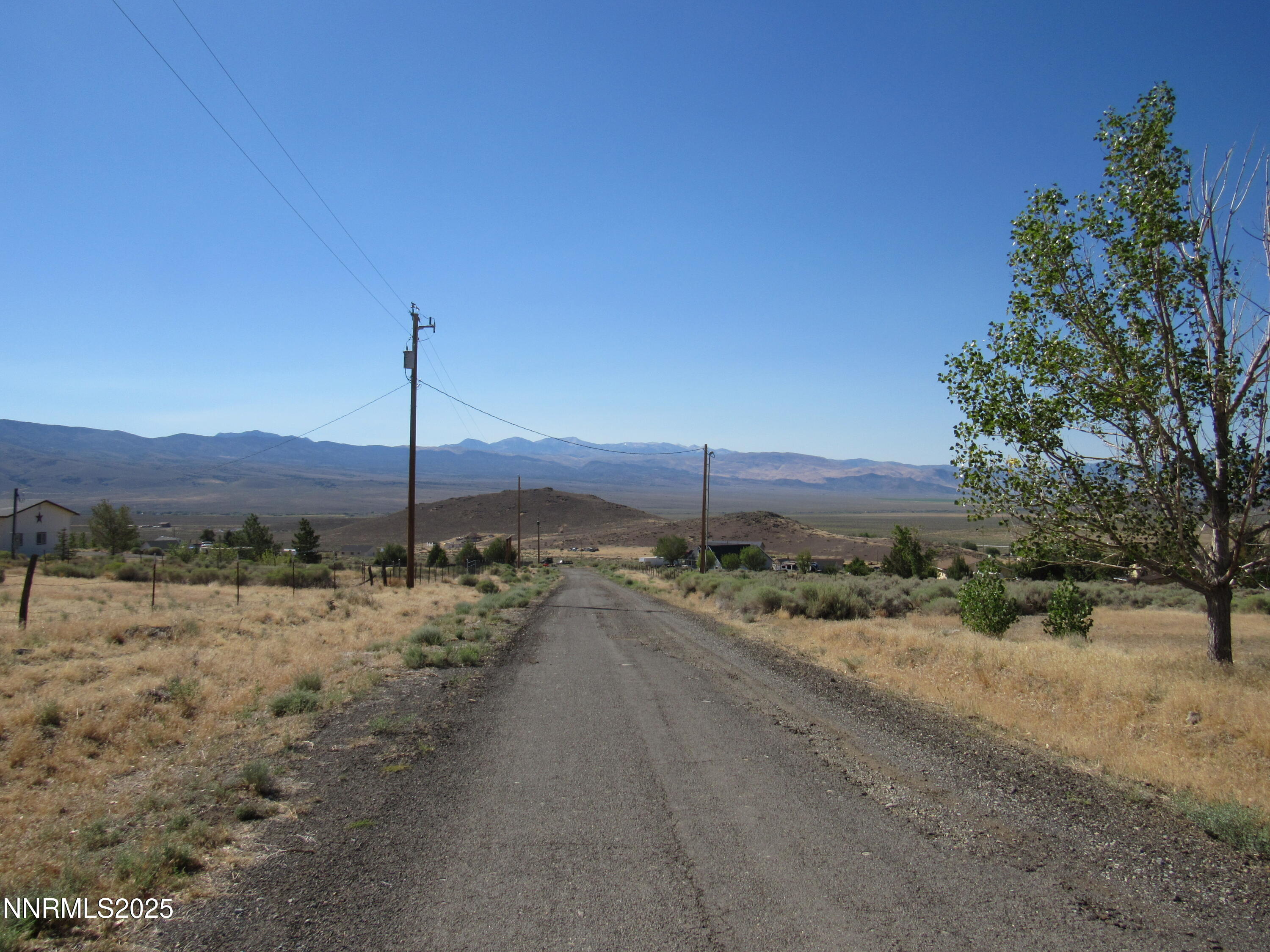 4151 Gray Hills Road Wellington, NV 89444 - Photo 24 of 25 a view of a road with a yard