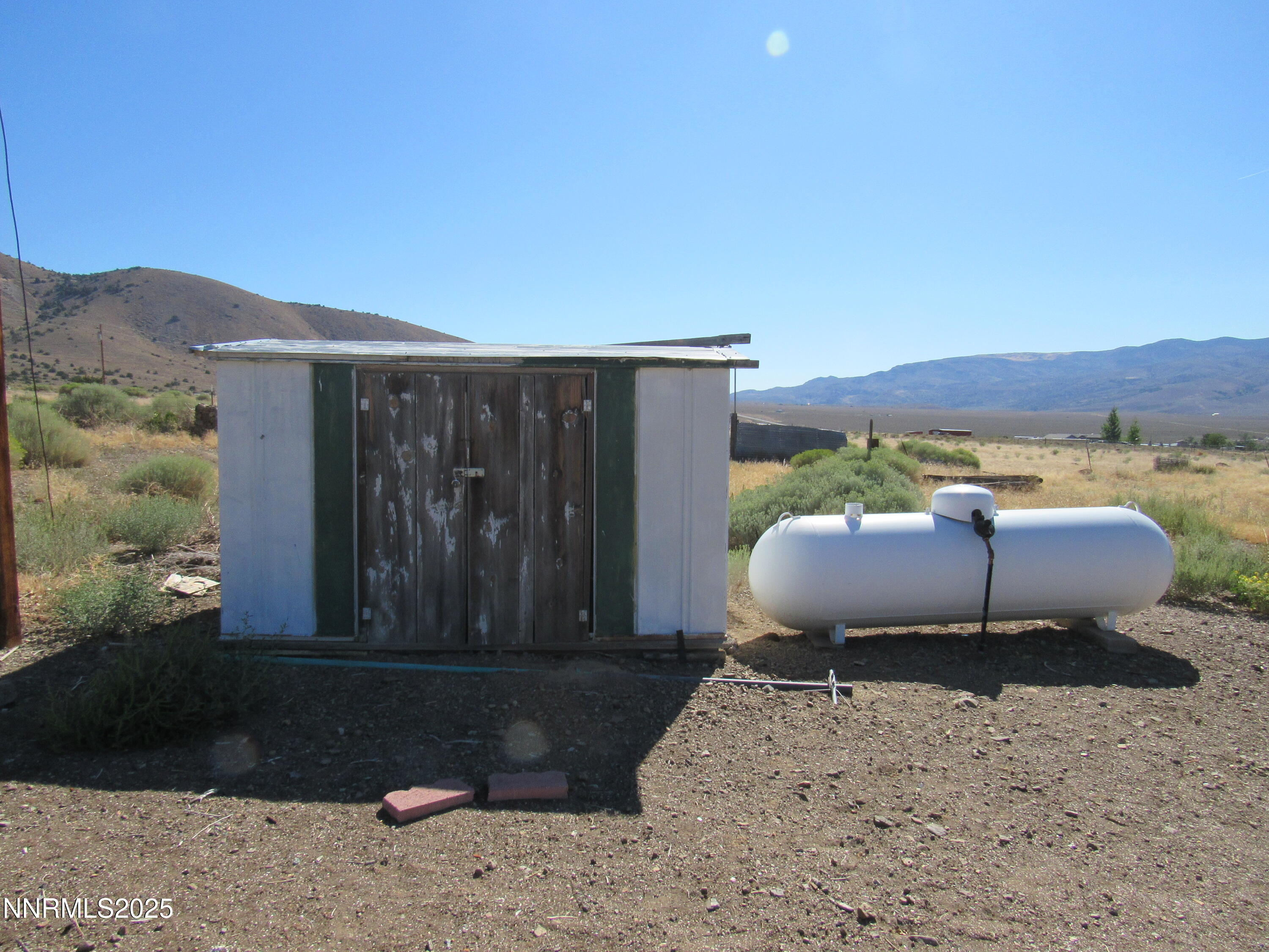 4151 Gray Hills Road Wellington, NV 89444 - Photo 10 of 25 a view of a backyard with sitting area