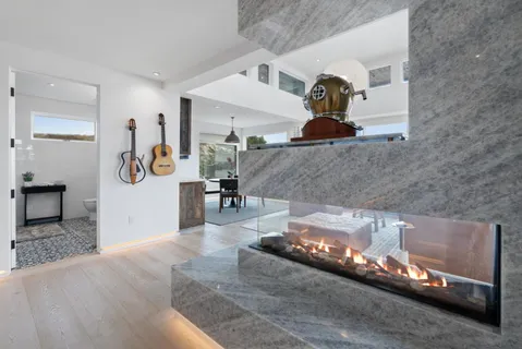 a kitchen with a stove and a sink