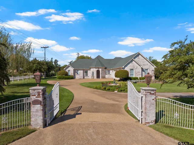 a view of a livingroom with furniture and chandelier