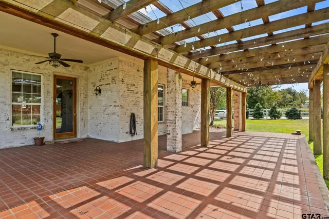 a view of a porch with a patio