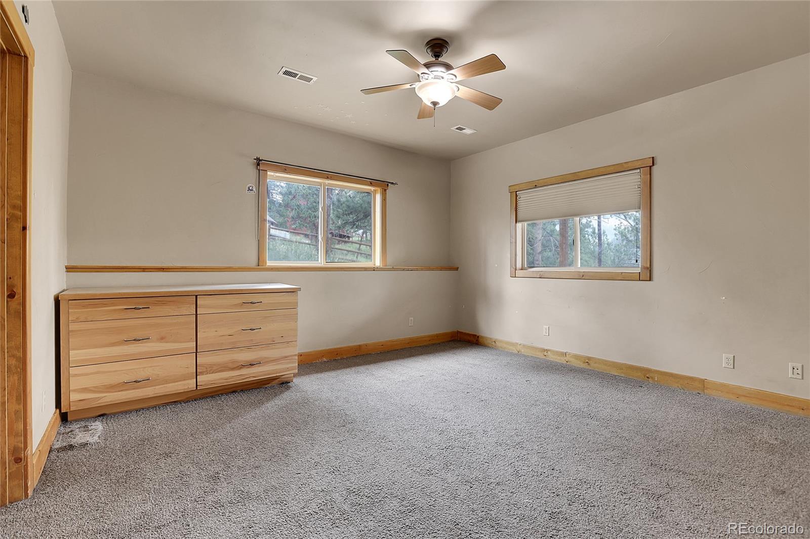 2063 Roland Drive Bailey, CO 80421 - Photo 39 of 49 a view of an empty room with a window