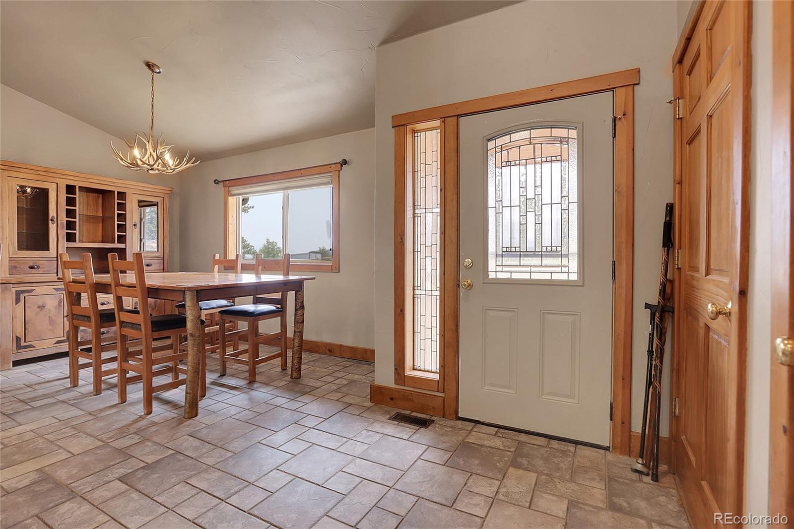 2063 Roland Drive Bailey, CO 80421 - Photo 10 of 49 a view of a livingroom with furniture and window