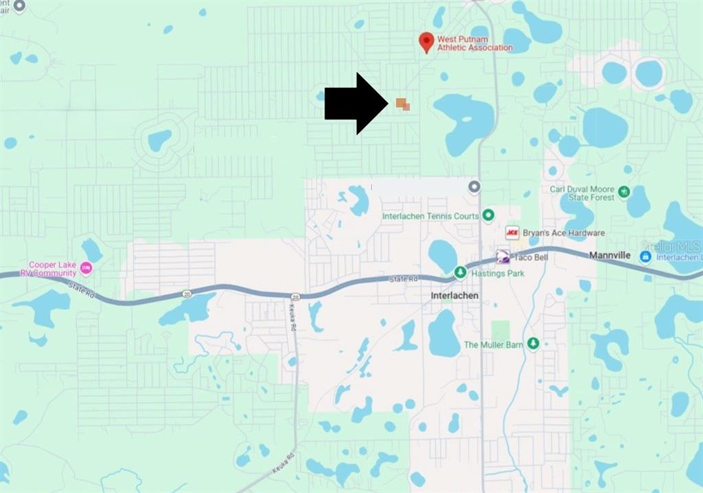 Xx Bay Street Interlachen, FL 32148 - Photo 7 of 7 a bathroom with a bathtub and a shower