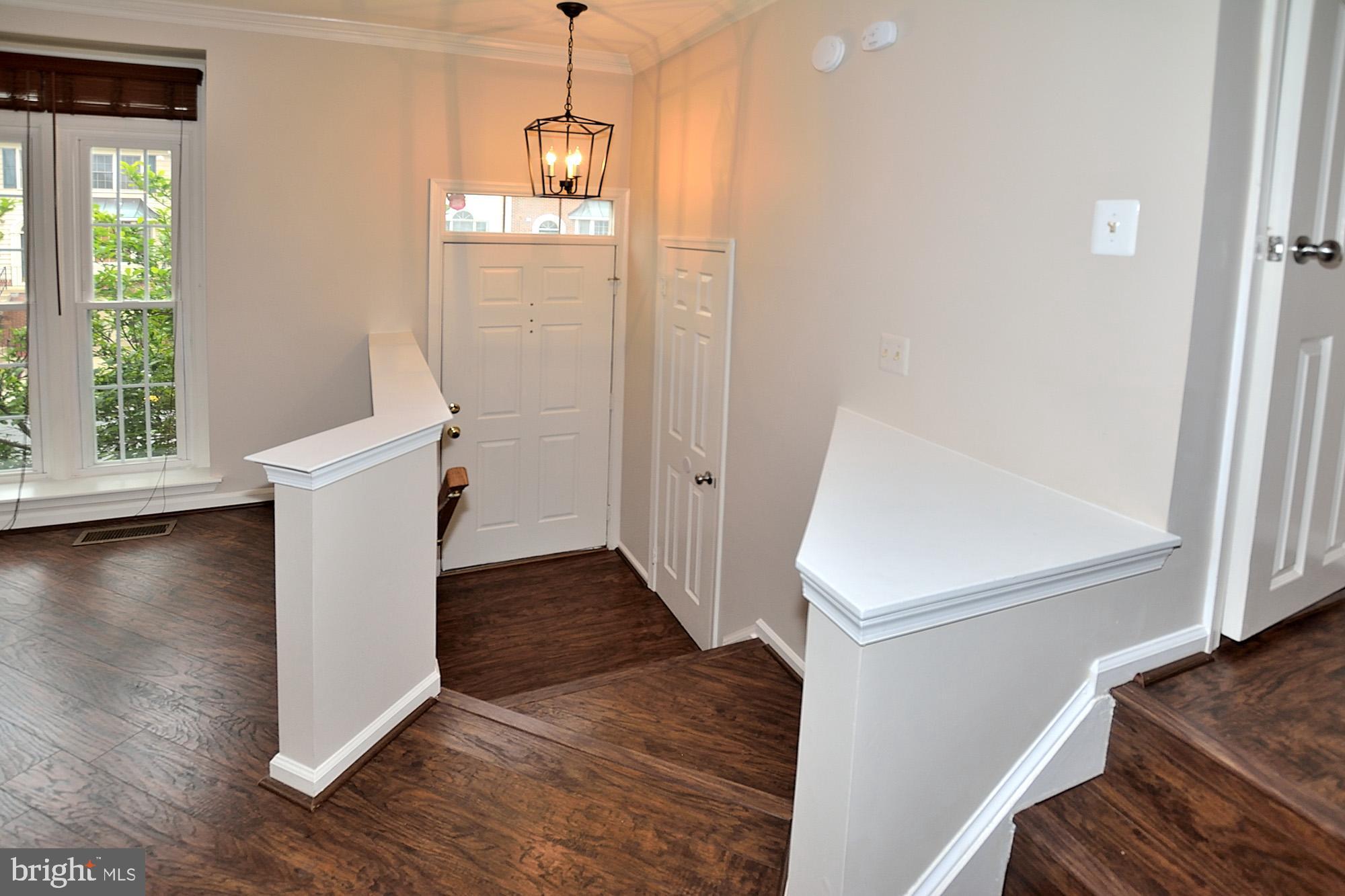 Foyer with new light fixture